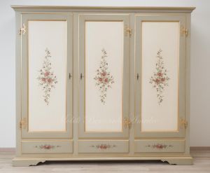 Hand-lacquered wood wardrobe with floral decorations and gold leaf