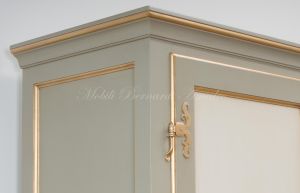 Hand-lacquered wood wardrobe with floral decorations and gold leaf