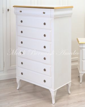 Cassettiera settimanale per camera da letto in legno massello con finitura laccata bianco e foglia oro