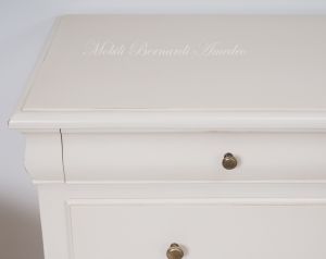 Classic Louis Philippe style chest of drawers with antique cream white finish
