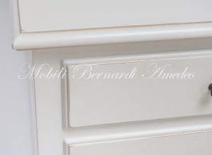 Classic style chest of drawers handcrafted in solid wood and lacquered in antique white
