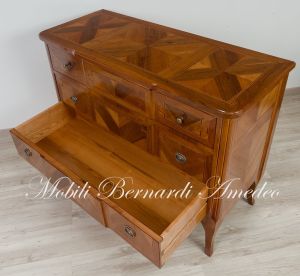 Chest of drawers handcrafted in solid wood richly inlaid with walnut and other essences