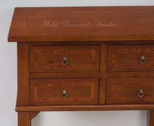 Entrance or corridor console chest of drawers made of solid walnut wood in a contemporary classic style