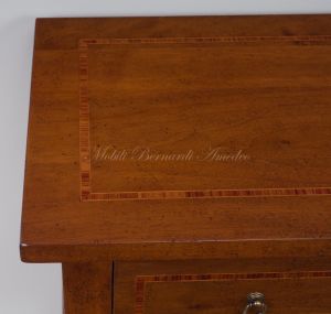 Entrance or corridor console chest of drawers made of solid walnut wood in a contemporary classic style