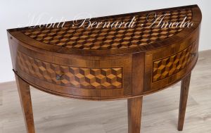 Crescent-shaped console in walnut wood with geometric inlays
