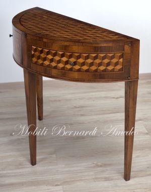 Crescent-shaped console in walnut wood with geometric inlays
