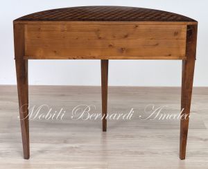 Crescent-shaped console in walnut wood with geometric inlays