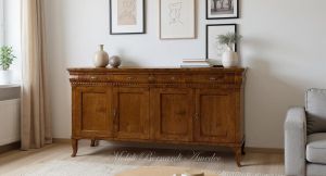 Handcrafted reproduction of a classic style sideboard in walnut wood with 4 doors and 4 drawers inserted in a living room with wooden floor