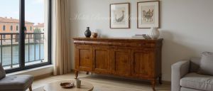 Handcrafted reproduction of a classic style sideboard in walnut wood with 4 doors and 4 drawers inserted in a living room with wooden floor