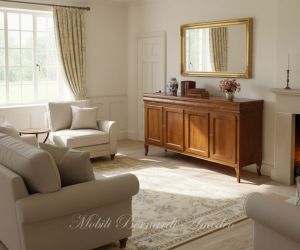 Reproduction of a wooden sideboard with a length of 200 cm in Louis Philippe style inserted in a classic - country living room
