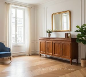 Reproduction of a wooden sideboard with a length of 200 cm in Louis Philippe style inserted in a classic and bright apartment
