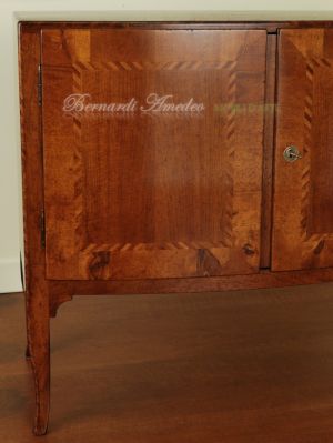 Classic style sideboard in solid walnut wood with inlays and high legs and with 2 closed doors