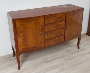 Slightly rounded sideboard handcrafted in solid walnut wood with classic style inlay