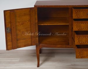 Slightly rounded sideboard handcrafted in solid walnut wood with classic style inlay