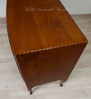 Slightly rounded sideboard handcrafted in solid walnut wood with classic style inlay