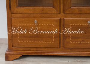 Display case for 12 hunting rifles made of classic style light colored solid wood