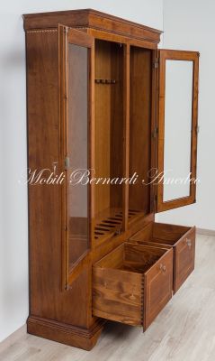 Display case for 12 hunting rifles made of classic style light colored solid wood