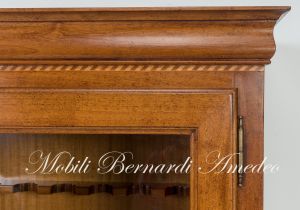 Display case for 12 hunting rifles made of classic style light colored solid wood