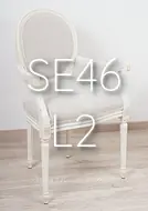 Poltroncina capotavola stile classico con finitura laccata e imbottita