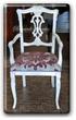 Armchair with armrests, padded seat