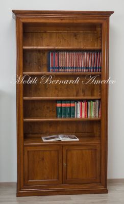 Libreria stile classico costruita in legno di noce con 2 ante e ripiani di grosso spessore