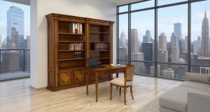 Libreria stile classico in legno massello di noce con intarsi inserita in una casa moderna