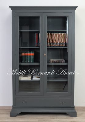 Libreria costruita in legno massello con finitura colorata grigio 2 ante e 1 cassetto
