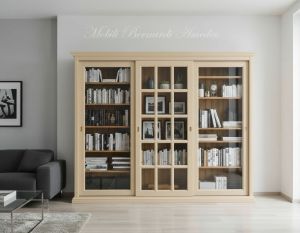 Vetrina libreria inserita in un soggiorno moderno realizzata in legno con 3 ante scorrevoli finitura colore ecru
