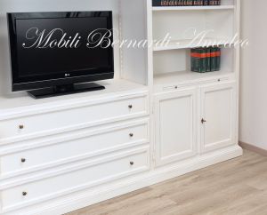 Libreria da soggiorno in legno finitura colore bianco con zona porta Tv