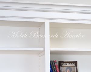 Libreria da soggiorno in legno finitura colore bianco con zona porta Tv
