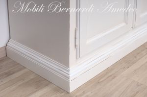 Libreria da soggiorno in legno finitura colore bianco con zona porta Tv