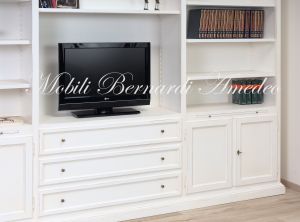 Libreria da soggiorno in legno finitura colore bianco con zona porta Tv
