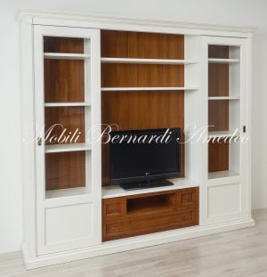 Libreria con ante scorrevoli in legno finitura bicolore con zona porta Tv centrale