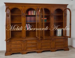 Libreria da studio realizzata in legno massiccio stile classico con 4 ante ad arco e basamento con cassetti