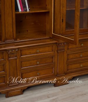 Libreria da studio realizzata in legno massiccio stile classico con 4 ante ad arco e basamento con cassetti