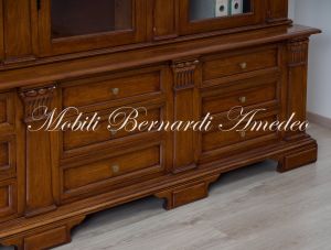 Libreria da studio realizzata in legno massiccio stile classico con 4 ante ad arco e basamento con cassetti