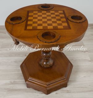 Tavolino rotondo con scacchiera in legno in svendita