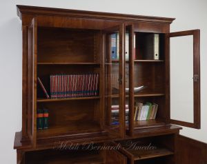 Bookcase built with classic style antique cherry wood with 4 closed doors and 4 glass doors