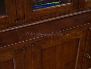 Bookcase built with classic style antique cherry wood with 4 closed doors and 4 glass doors