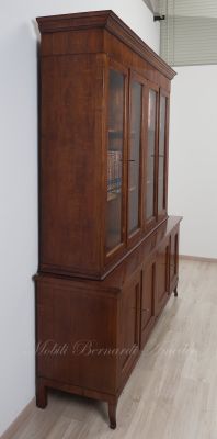 Bookcase built with classic style antique cherry wood with 4 closed doors and 4 glass doors