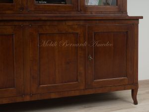 Bookcase built with classic style antique cherry wood with 4 closed doors and 4 glass doors