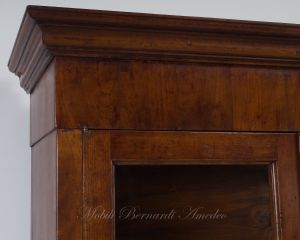 Bookcase built with classic style antique cherry wood with 4 closed doors and 4 glass doors