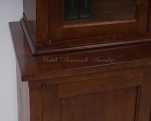 Bookcase built with classic style antique cherry wood with 4 closed doors and 4 glass doors