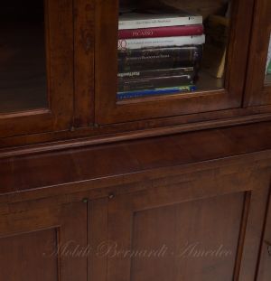 Bookcase built with classic style antique cherry wood with 4 closed doors and 4 glass doors