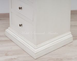 Settimanale in legno laccato bianco - dettaglio del basamento e dei cassetti