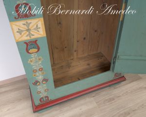 Original antique ship's cabinet restored and hand lacquered with decorations