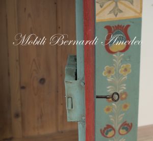 Original antique ship's cabinet restored and hand lacquered with decorations