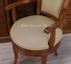 Classic style office swivel chair upholstered in genuine beige leather