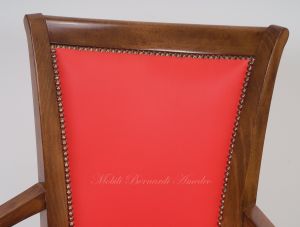 Classic style study swivel chair padded and covered with genuine orange Italian leather