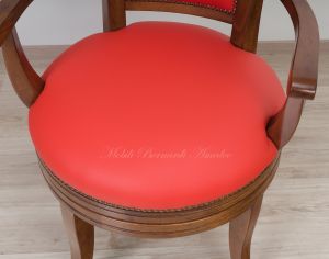 Classic style study swivel chair padded and covered with genuine orange Italian leather